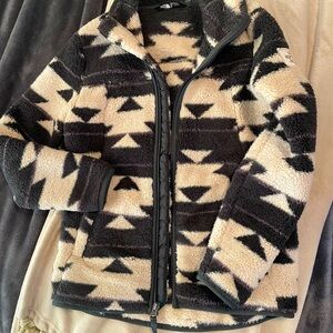 The North Face Sherpa girls coat. Size M/M 10/12.